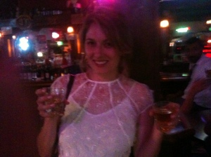 The bride having post-Wedding drinks at the 2 a.m club. La classe. 